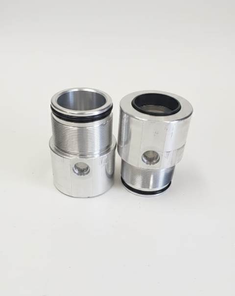 Aluminum hydraulic cylinder gland nuts with threaded body and O-ring seals